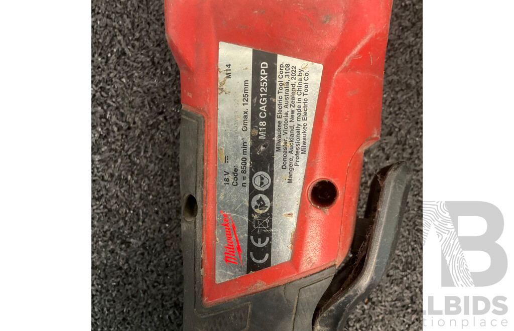 MILWAUKEE M18 Fuel Angle Grinder (CAG125XPD) and WORX Screwdriver - Lot of 2