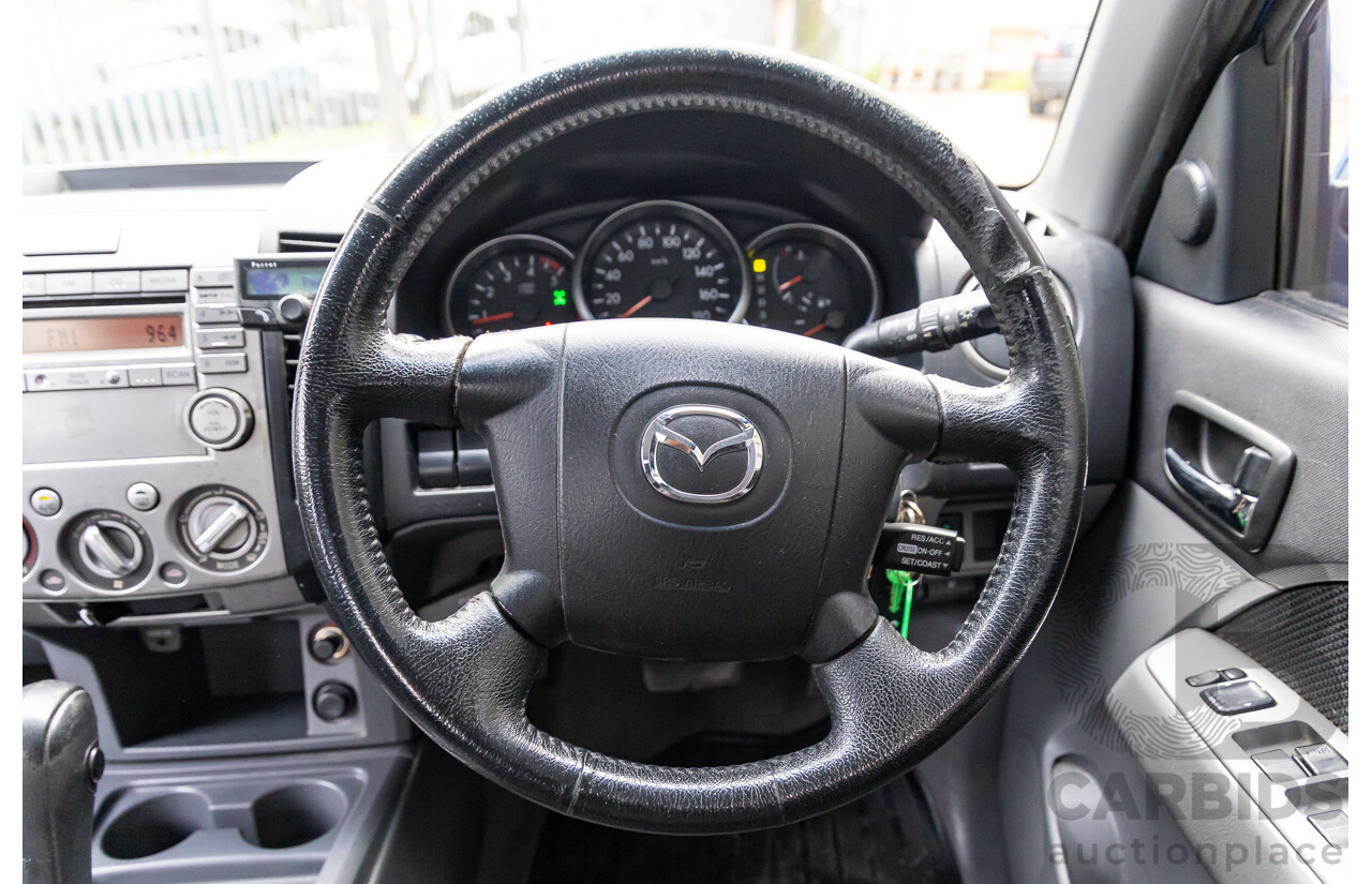 1/2011 Mazda BT-50 Boss B3000 SDX (4x4) 09.5 Dual Cab P/Up Lagoon Blue Metallic Turbo Diesel 3.0L