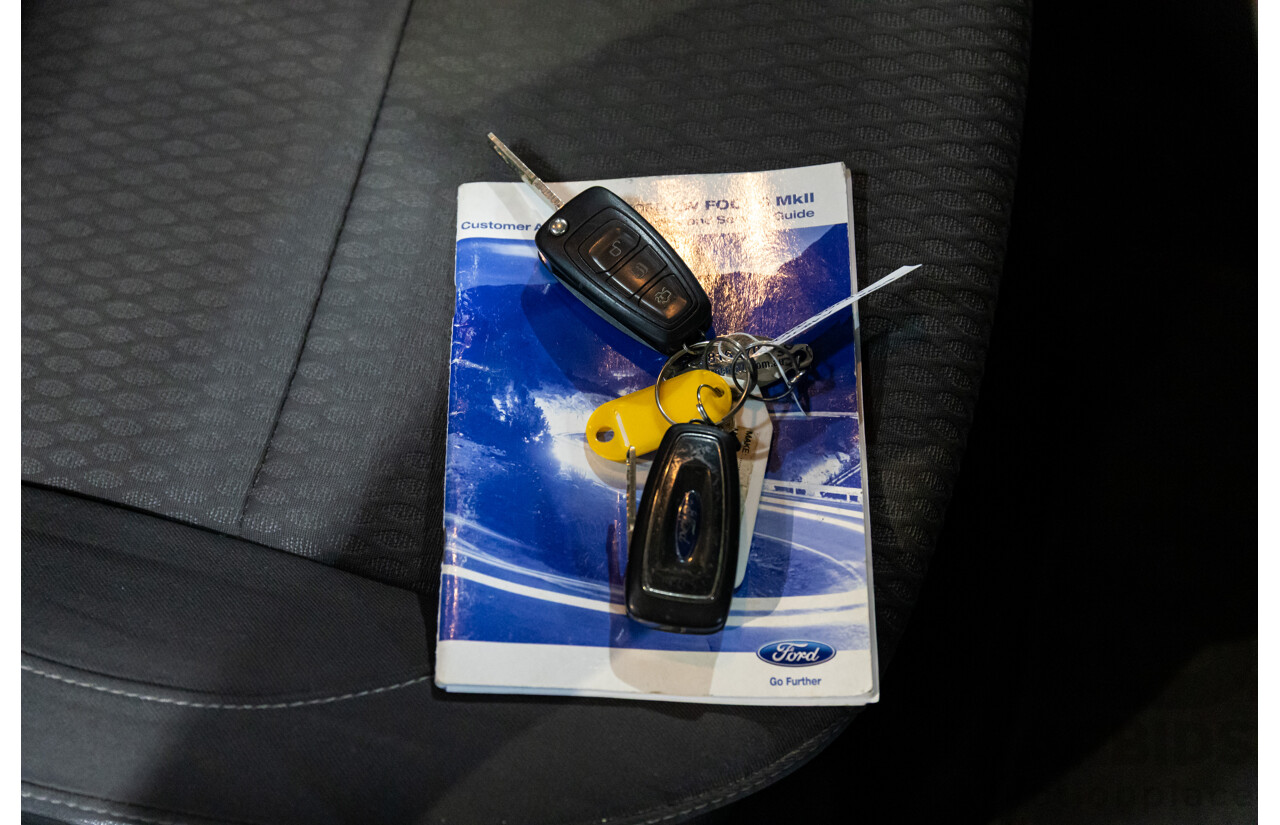 4/2013 Ford Focus Trend LW MK2 5d Hatchback Ruby Red Metallic 2.0L