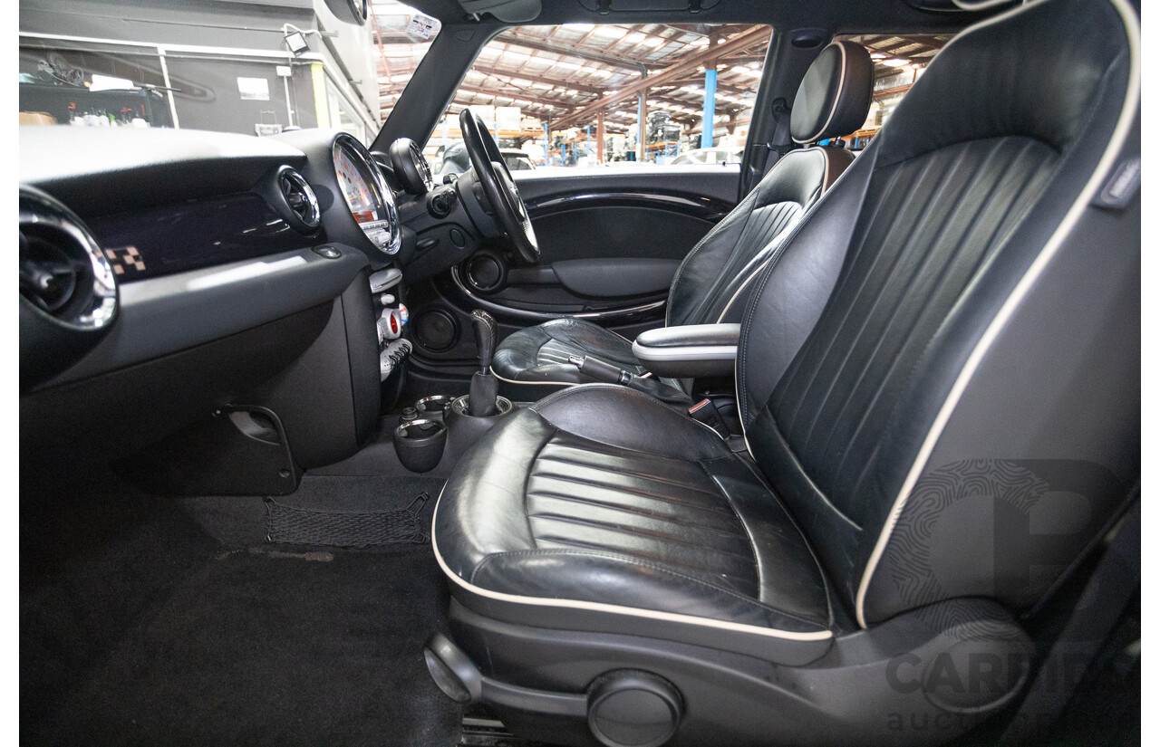 03/2009 Mini Cooper S John Cooper Works Performance Package R56 2d Hatchback British Racing Green Metallic Turbo 1.6L