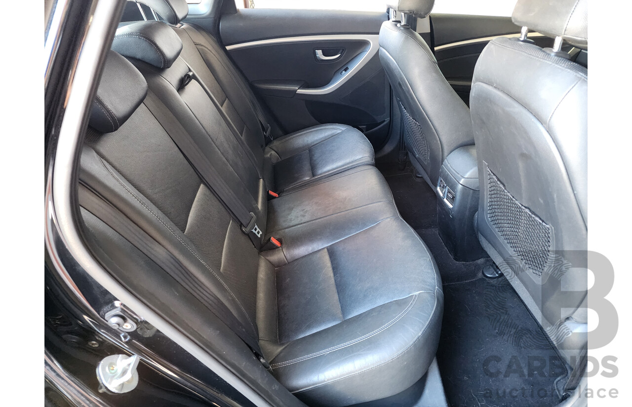 10/2014 Hyundai i30 Premium GD MY14 5d Hatchback Black 1.8L