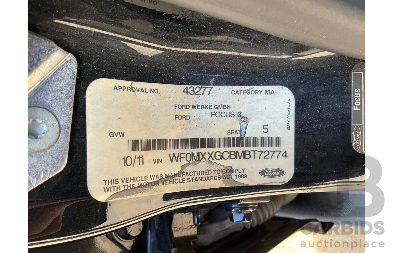 10/2011 Ford Focus Titanium LW 5d Hatchback Black Ebony Metallic Turbo Diesel 2.0L