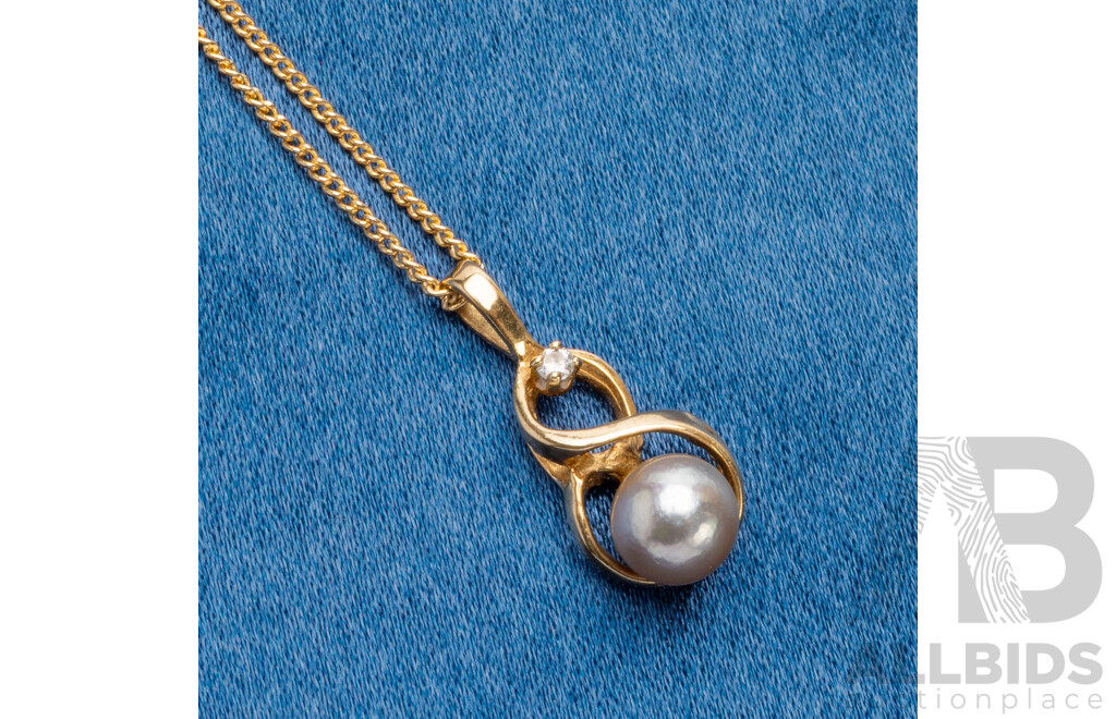 14ct Yellow Gold Pendant with Cultured Freshwater Pearl, Diamond. Gold Plated Chain
