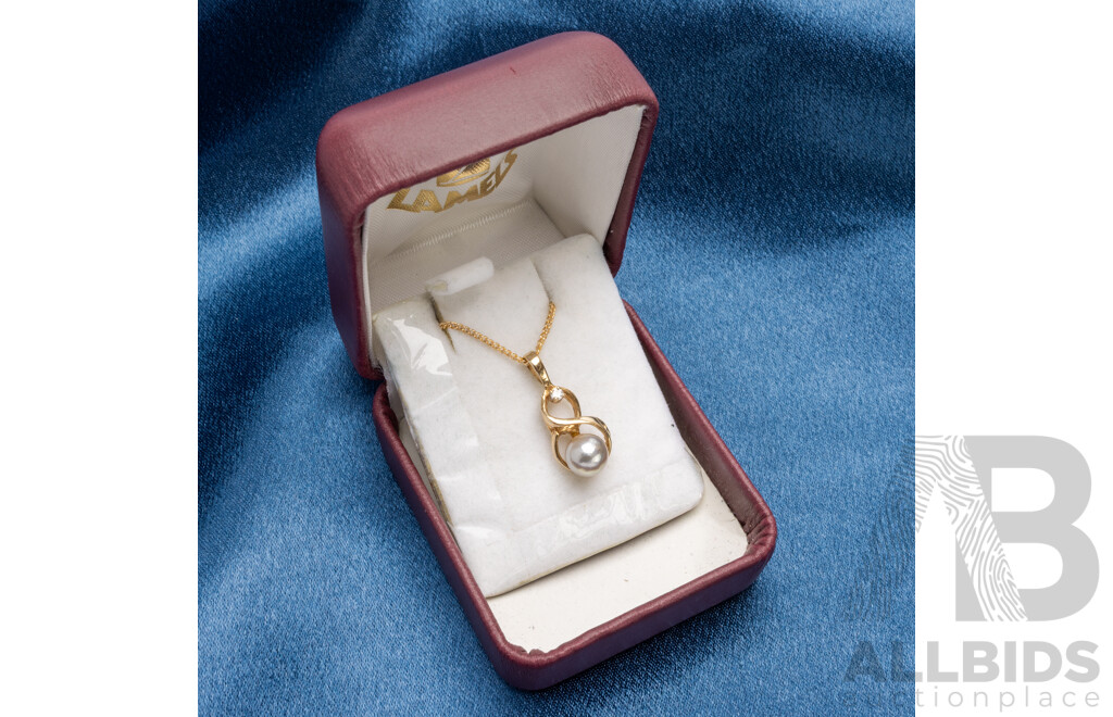 14ct Yellow Gold Pendant with Cultured Freshwater Pearl, Diamond. Gold Plated Chain