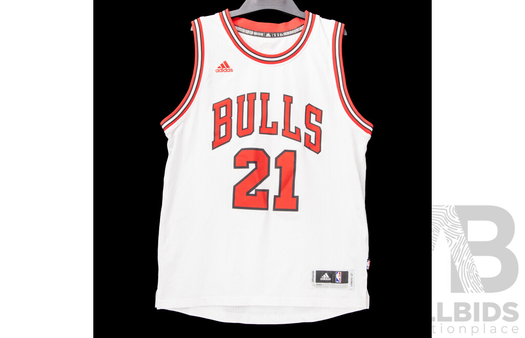 L13 - Collection of Seven Chicago Bull Basket Ball Jerseys