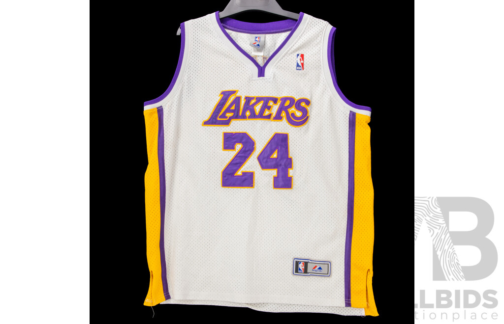 Collection of Five Las Angles Lakers Basket Ball Jerseys and a Pair of Shorts