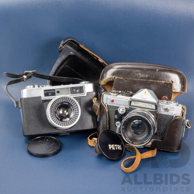 Pair of Vintage SLR Cameras Inc a Petri by Pentax and Yashica
