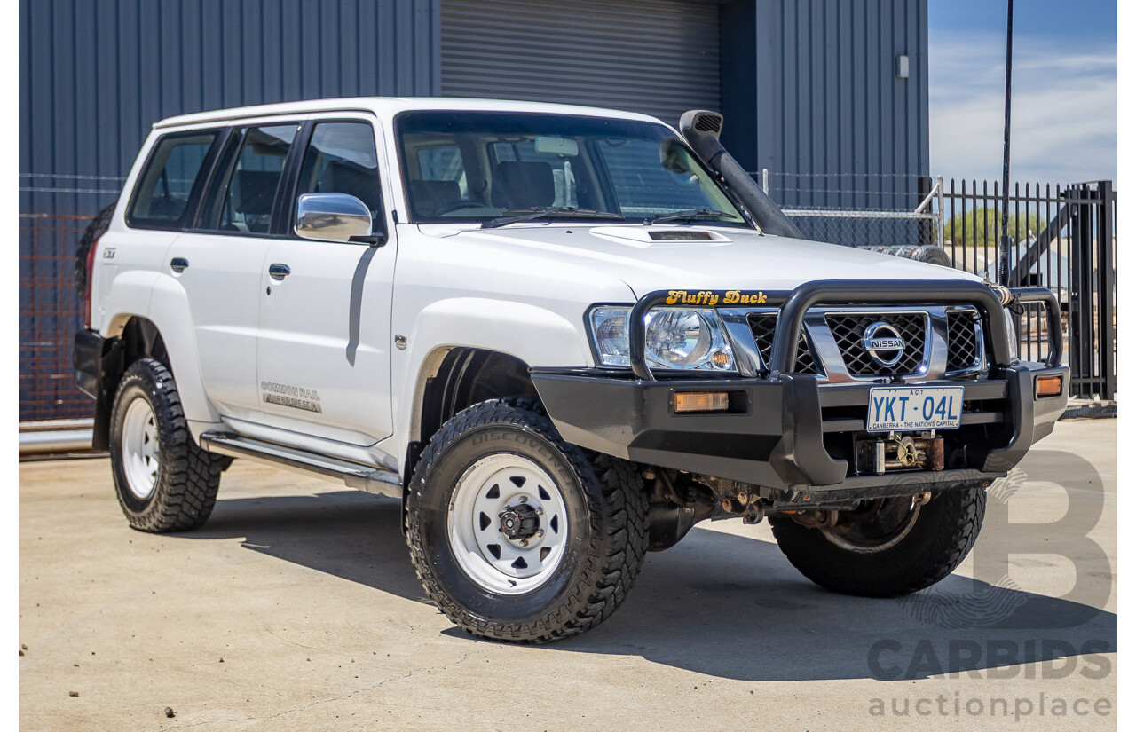 3/2010 Nissan Patrol ST (4x4) GU VI 4d Wagon Polar White Turbo Diesel 3.0L - 7 Seats