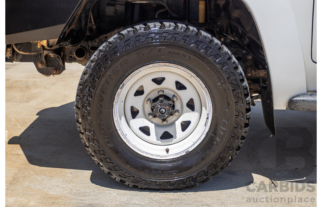 3/2010 Nissan Patrol ST (4x4) GU VI 4d Wagon Polar White Turbo Diesel 3.0L - 7 Seats