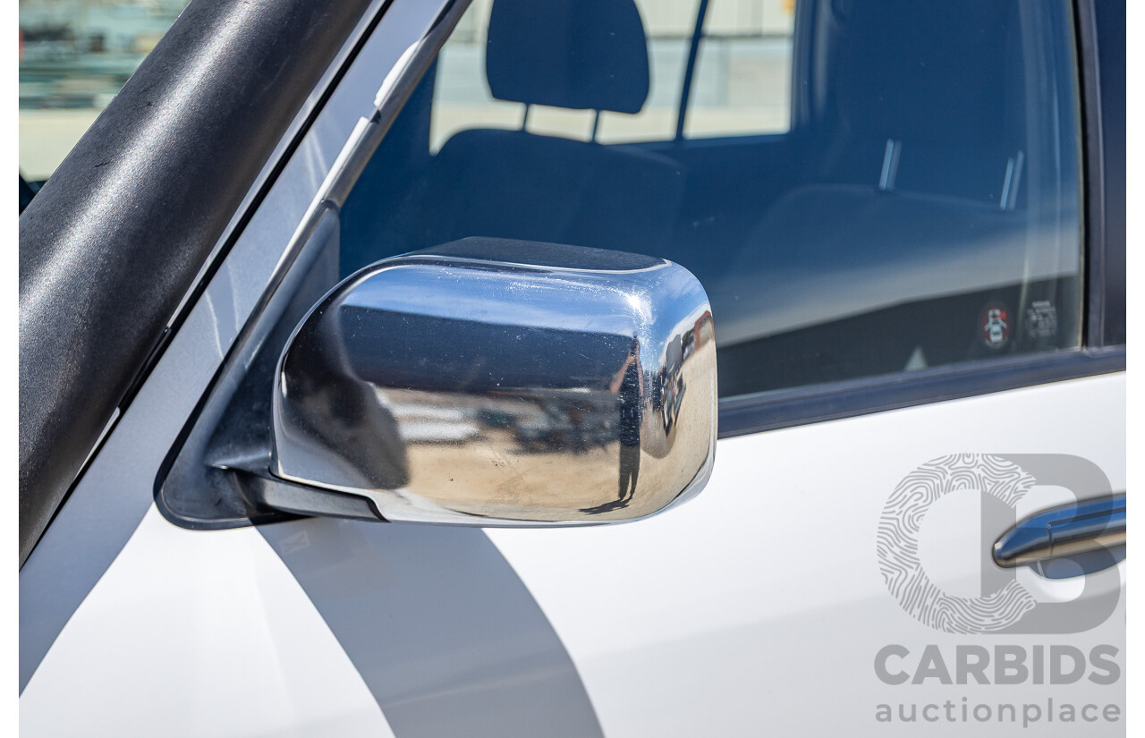 3/2010 Nissan Patrol ST (4x4) GU VI 4d Wagon Polar White Turbo Diesel 3.0L - 7 Seats