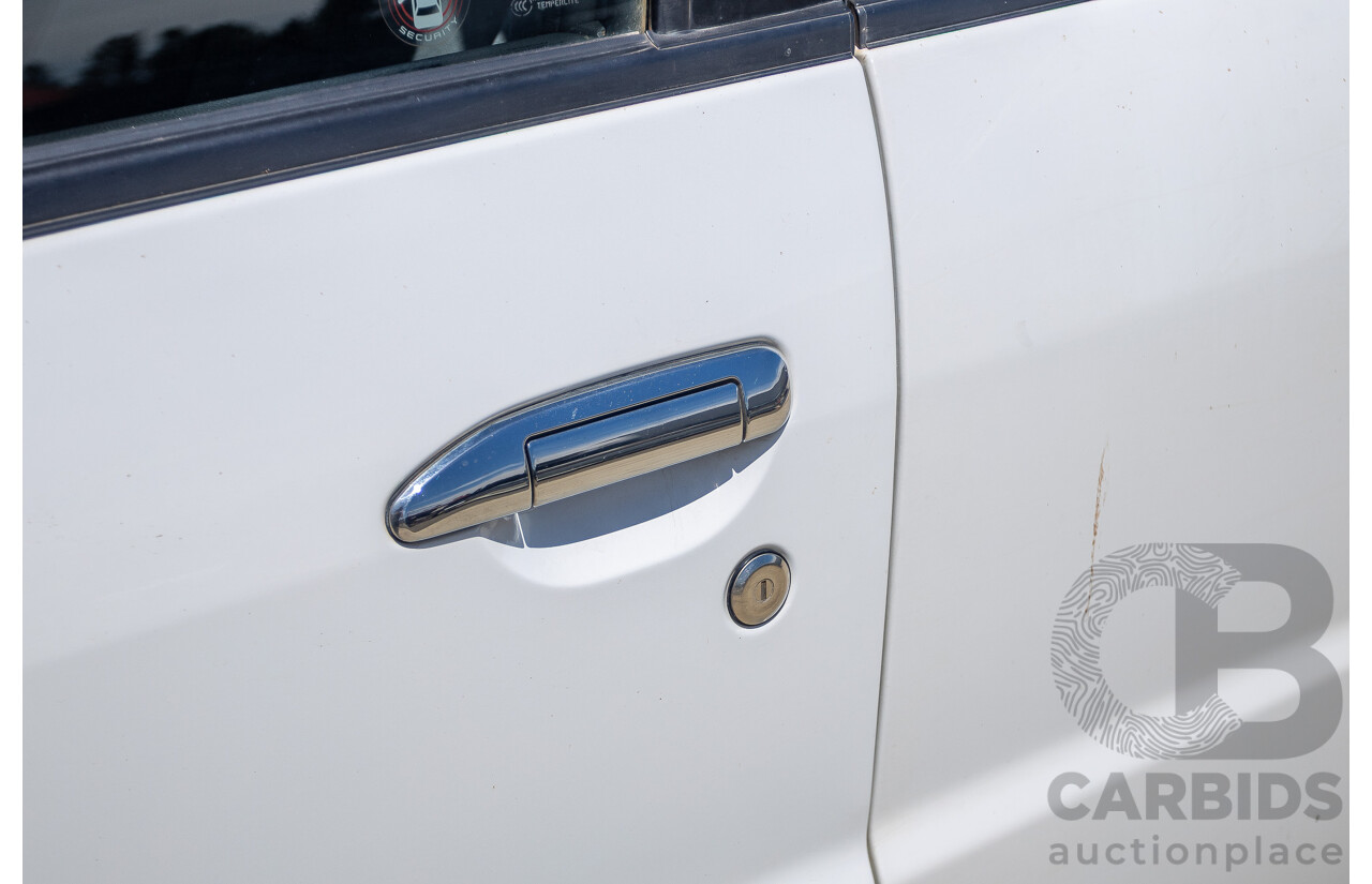 3/2010 Nissan Patrol ST (4x4) GU VI 4d Wagon Polar White Turbo Diesel 3.0L - 7 Seats