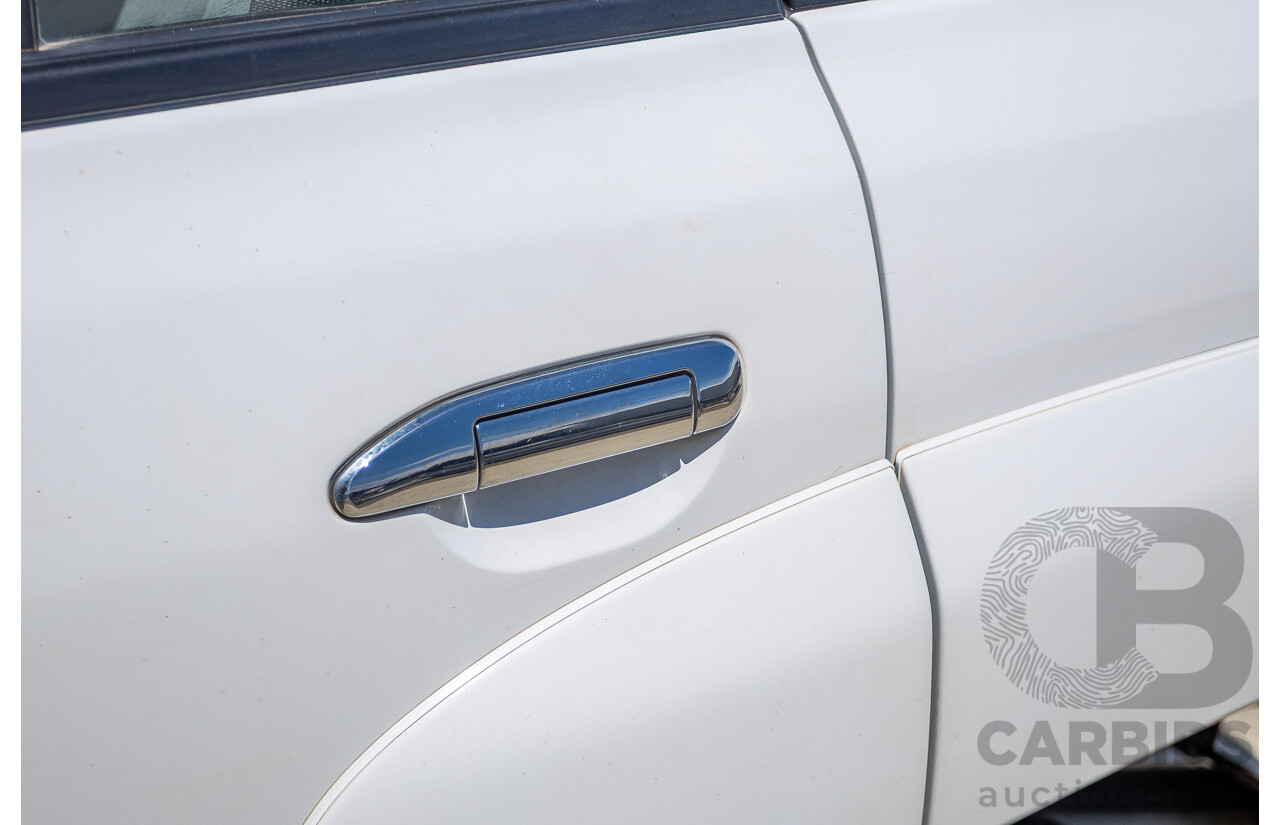 3/2010 Nissan Patrol ST (4x4) GU VI 4d Wagon Polar White Turbo Diesel 3.0L - 7 Seats