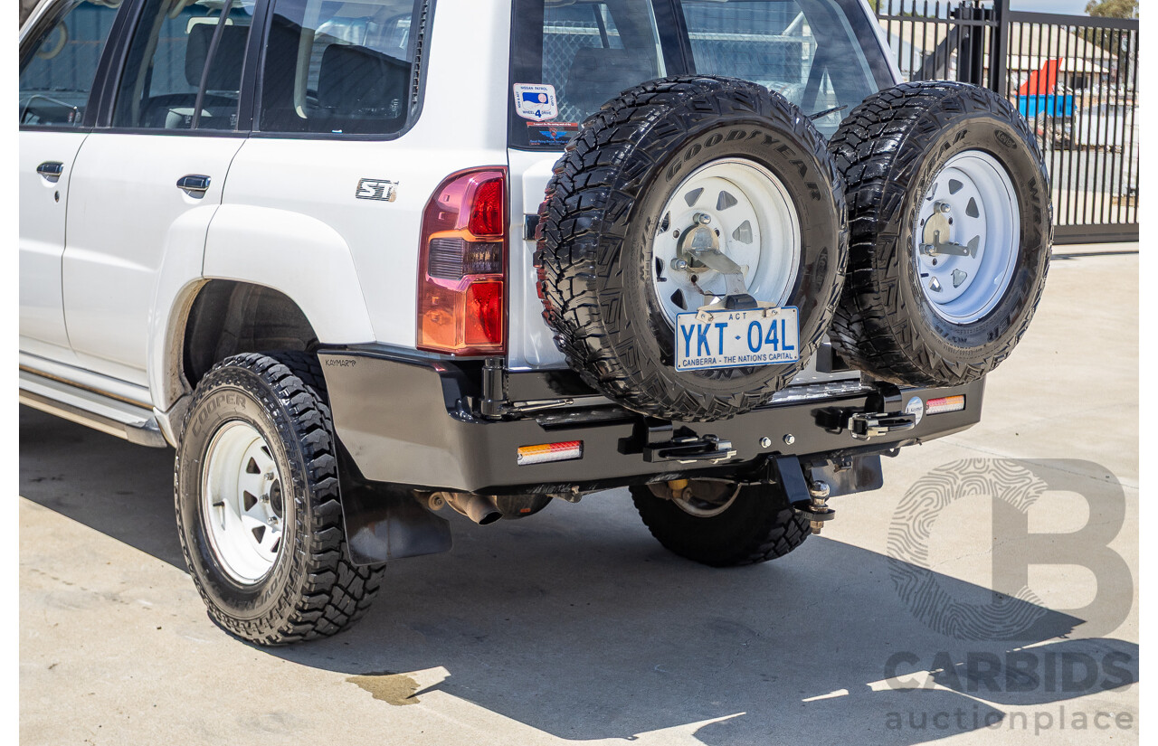 3/2010 Nissan Patrol ST (4x4) GU VI 4d Wagon Polar White Turbo Diesel 3.0L - 7 Seats