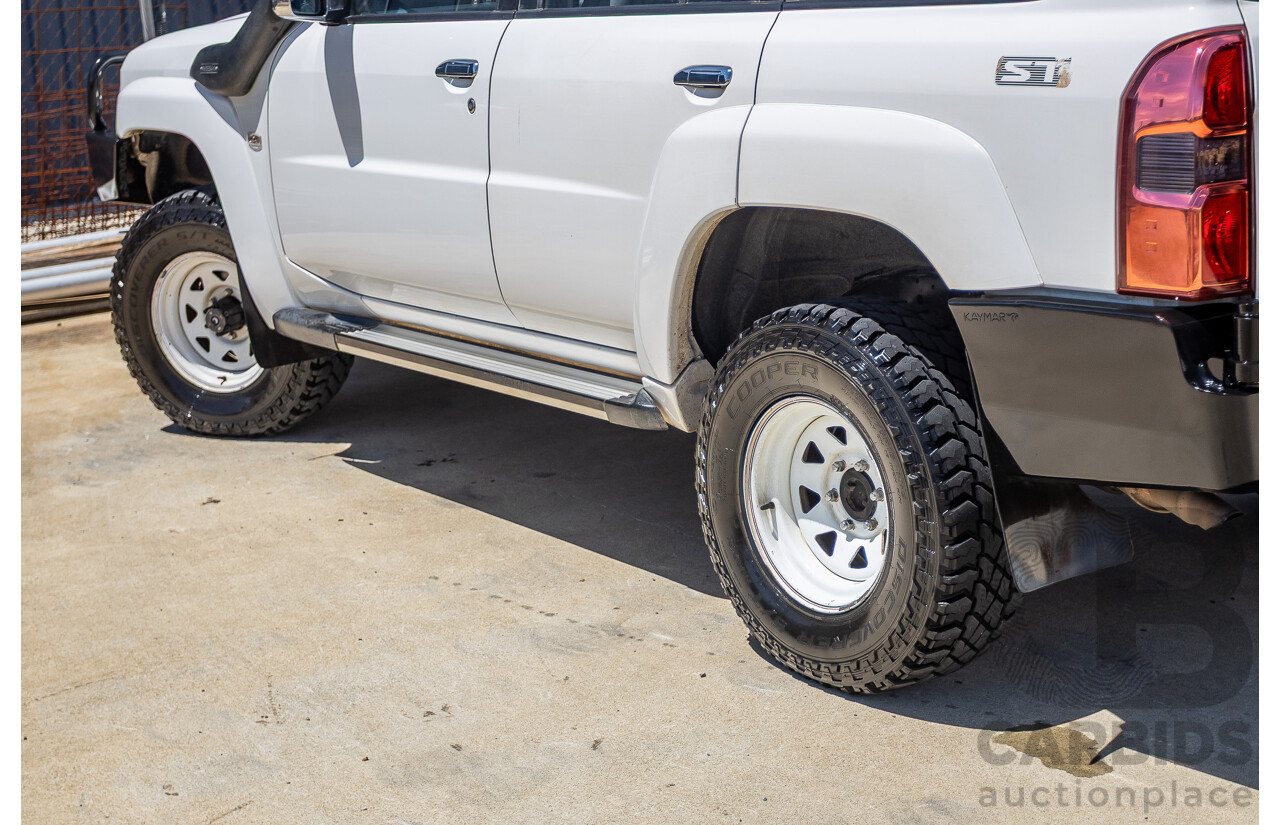 3/2010 Nissan Patrol ST (4x4) GU VI 4d Wagon Polar White Turbo Diesel 3.0L - 7 Seats