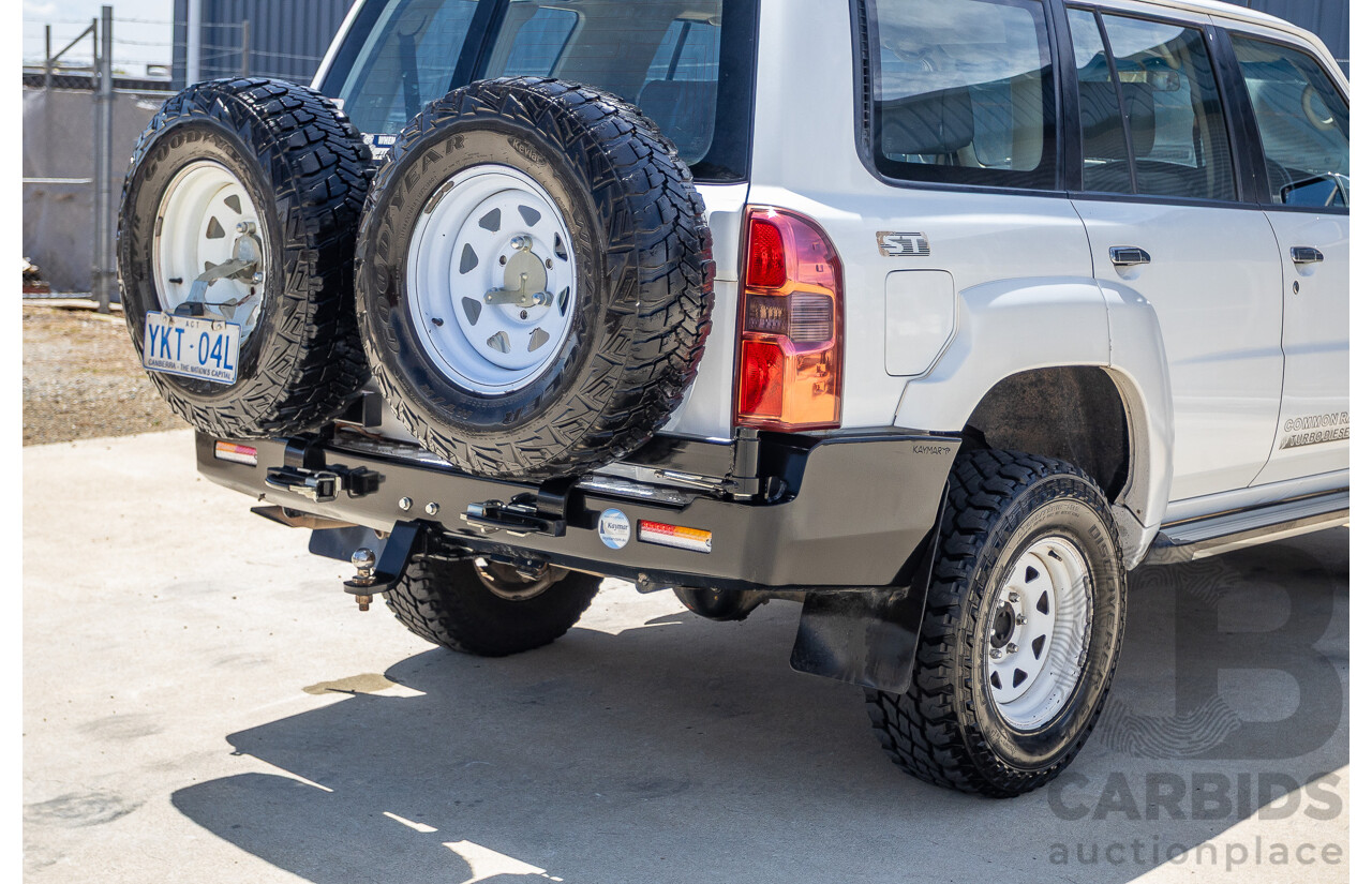 3/2010 Nissan Patrol ST (4x4) GU VI 4d Wagon Polar White Turbo Diesel 3.0L - 7 Seats