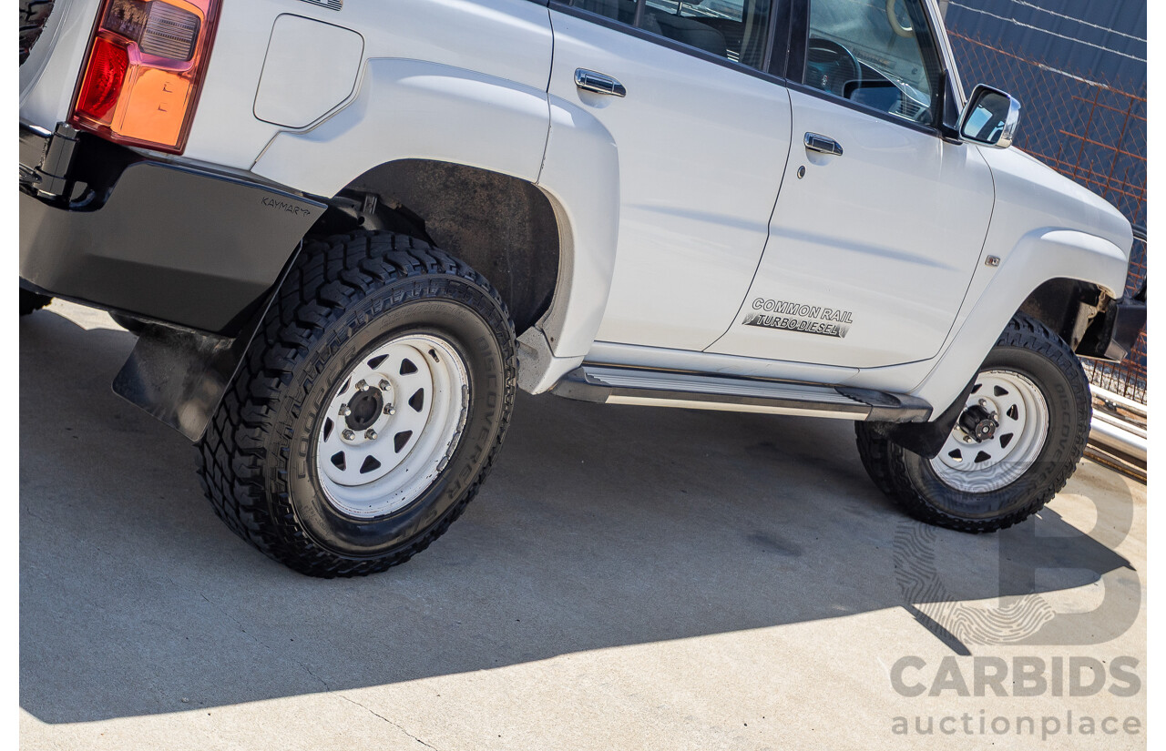 3/2010 Nissan Patrol ST (4x4) GU VI 4d Wagon Polar White Turbo Diesel 3.0L - 7 Seats