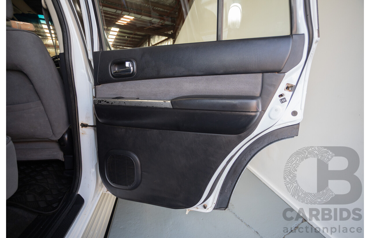 3/2010 Nissan Patrol ST (4x4) GU VI 4d Wagon Polar White Turbo Diesel 3.0L - 7 Seats