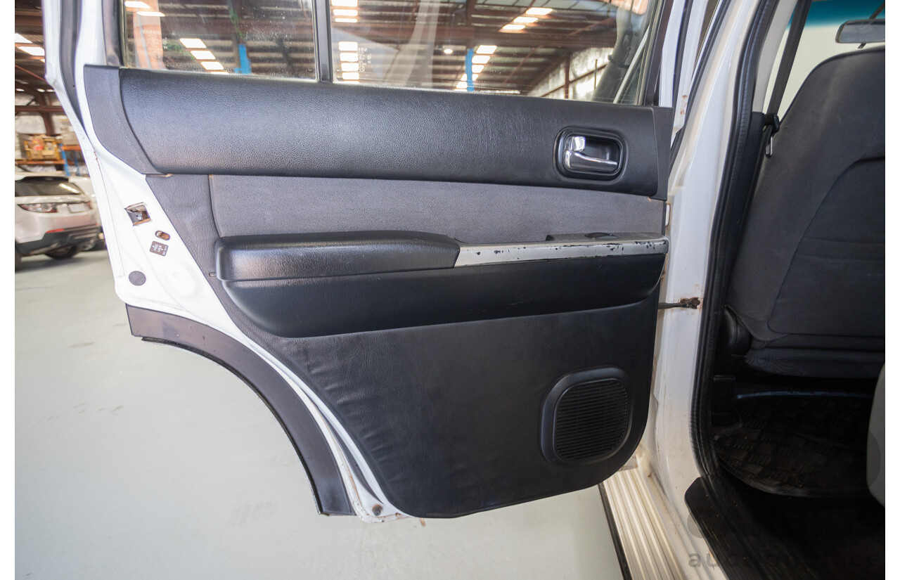 3/2010 Nissan Patrol ST (4x4) GU VI 4d Wagon Polar White Turbo Diesel 3.0L - 7 Seats