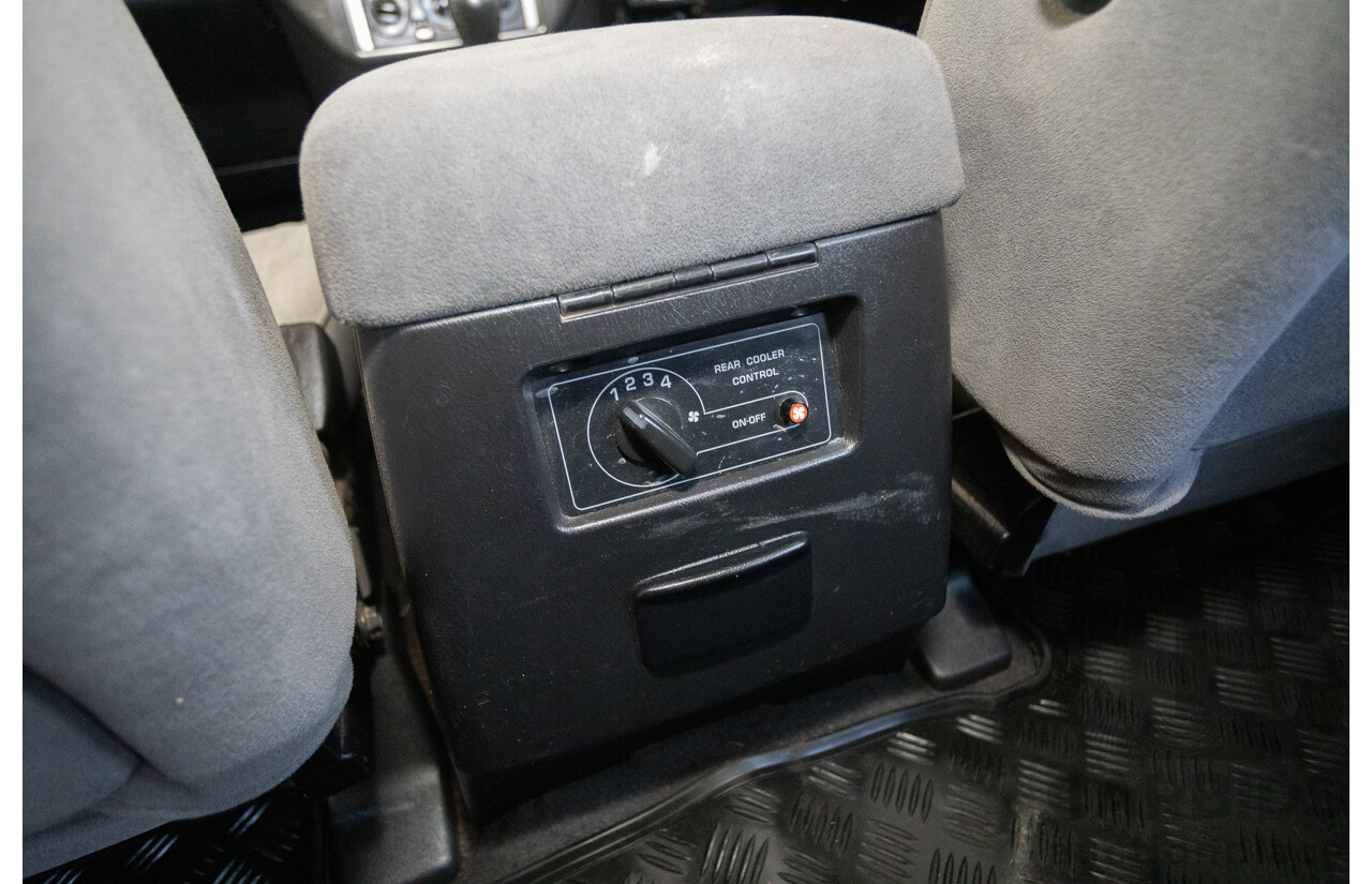 3/2010 Nissan Patrol ST (4x4) GU VI 4d Wagon Polar White Turbo Diesel 3.0L - 7 Seats