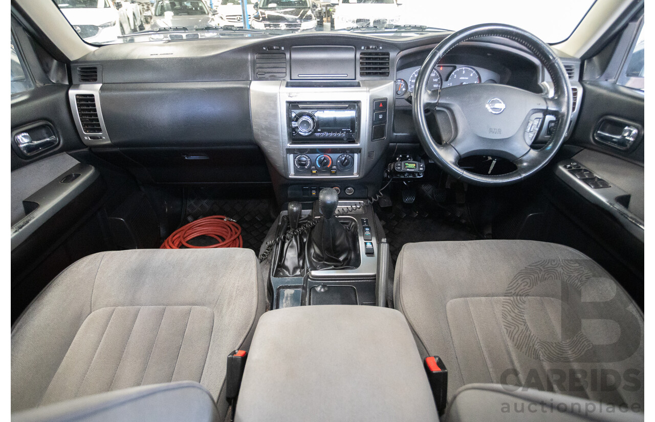 3/2010 Nissan Patrol ST (4x4) GU VI 4d Wagon Polar White Turbo Diesel 3.0L - 7 Seats