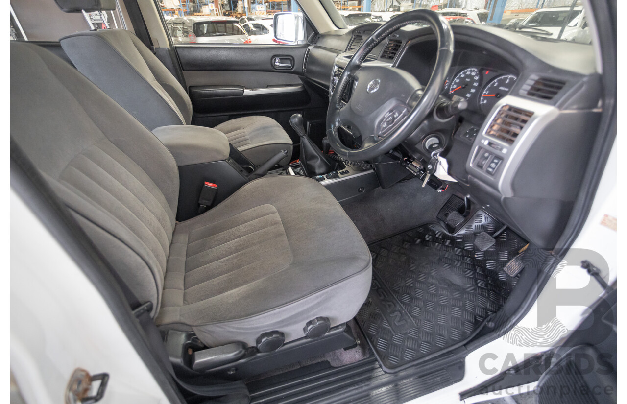 3/2010 Nissan Patrol ST (4x4) GU VI 4d Wagon Polar White Turbo Diesel 3.0L - 7 Seats