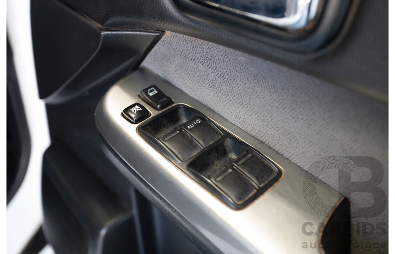 3/2010 Nissan Patrol ST (4x4) GU VI 4d Wagon Polar White Turbo Diesel 3.0L - 7 Seats