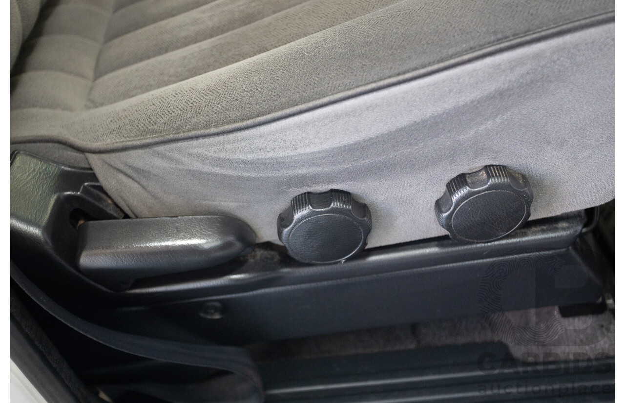 3/2010 Nissan Patrol ST (4x4) GU VI 4d Wagon Polar White Turbo Diesel 3.0L - 7 Seats