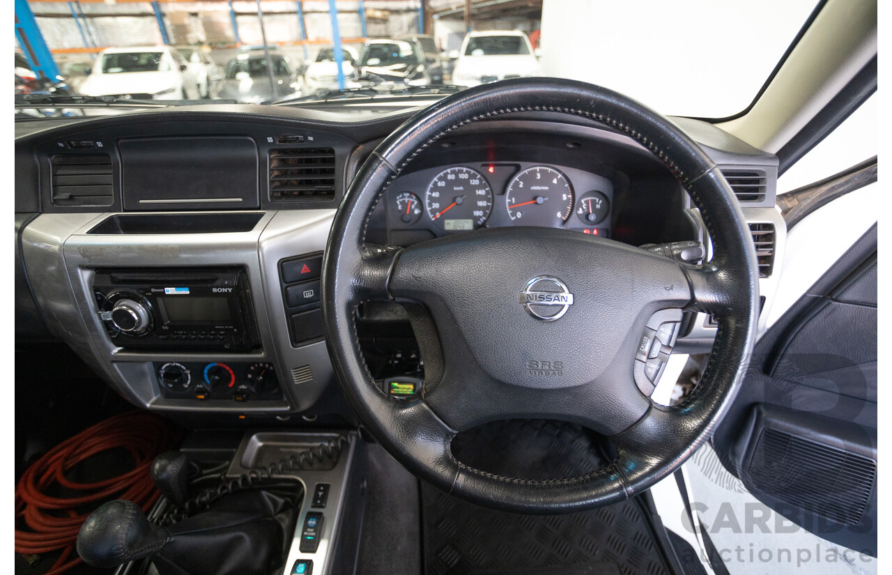 3/2010 Nissan Patrol ST (4x4) GU VI 4d Wagon Polar White Turbo Diesel 3.0L - 7 Seats