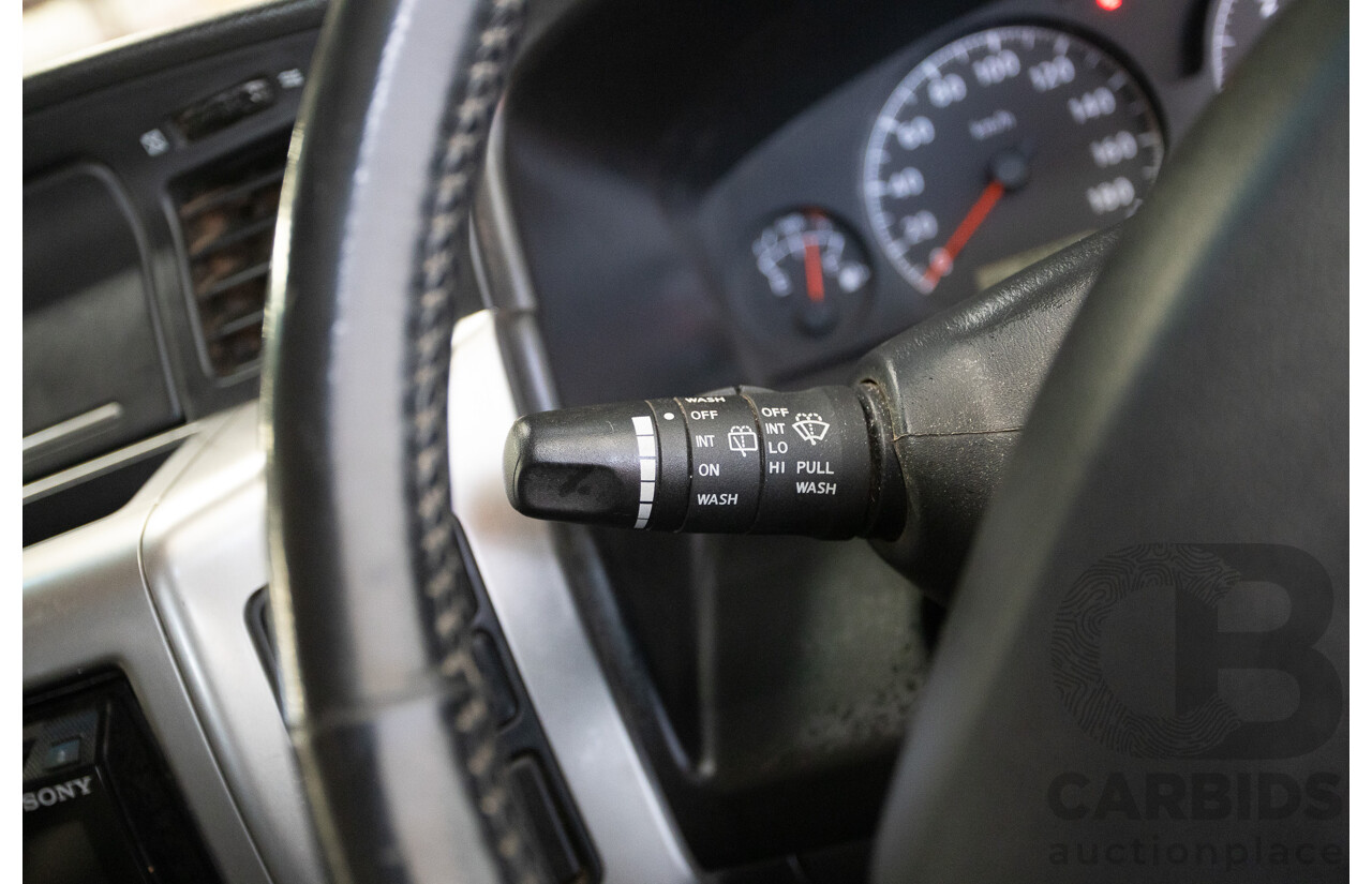 3/2010 Nissan Patrol ST (4x4) GU VI 4d Wagon Polar White Turbo Diesel 3.0L - 7 Seats