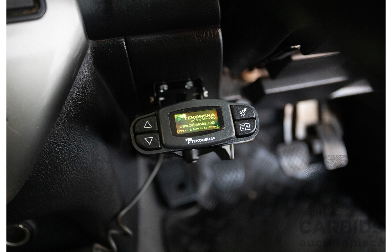 3/2010 Nissan Patrol ST (4x4) GU VI 4d Wagon Polar White Turbo Diesel 3.0L - 7 Seats