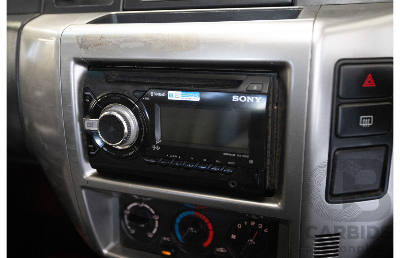 3/2010 Nissan Patrol ST (4x4) GU VI 4d Wagon Polar White Turbo Diesel 3.0L - 7 Seats