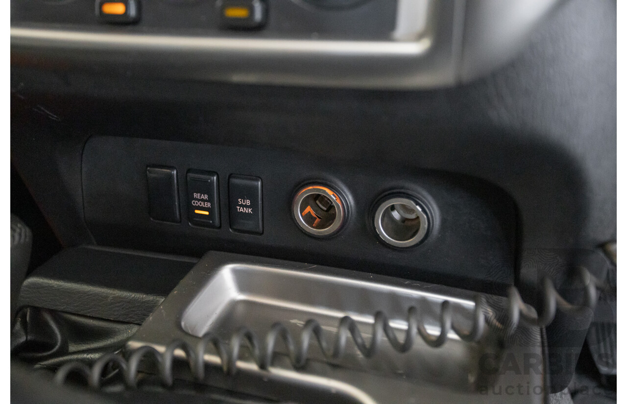 3/2010 Nissan Patrol ST (4x4) GU VI 4d Wagon Polar White Turbo Diesel 3.0L - 7 Seats