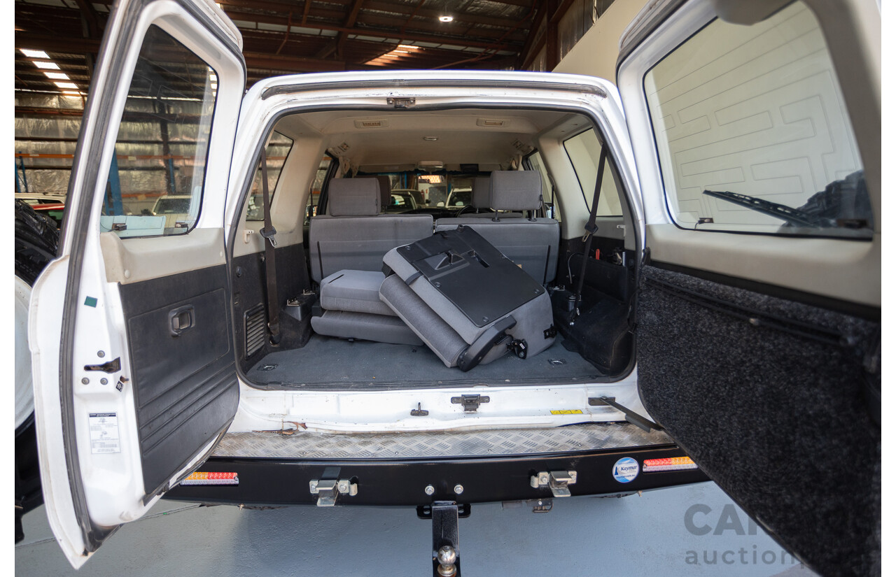 3/2010 Nissan Patrol ST (4x4) GU VI 4d Wagon Polar White Turbo Diesel 3.0L - 7 Seats