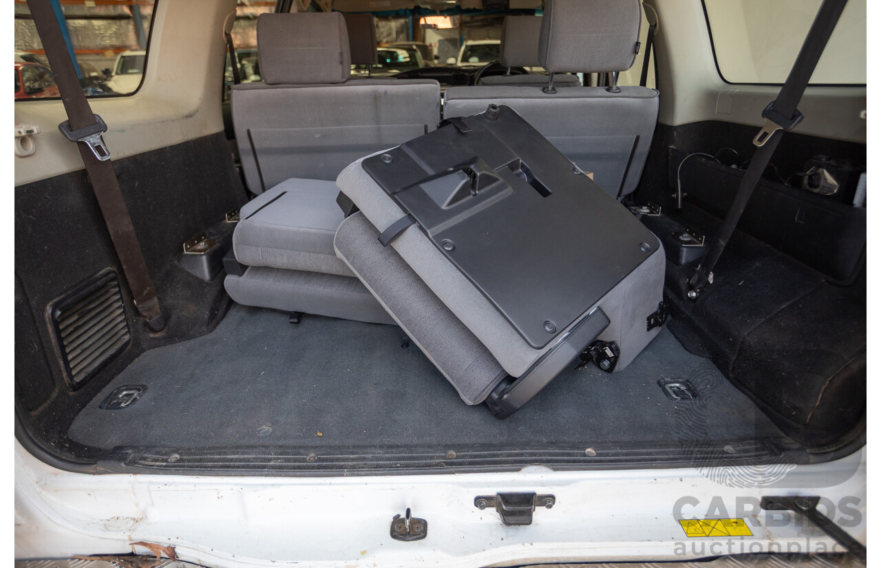 3/2010 Nissan Patrol ST (4x4) GU VI 4d Wagon Polar White Turbo Diesel 3.0L - 7 Seats