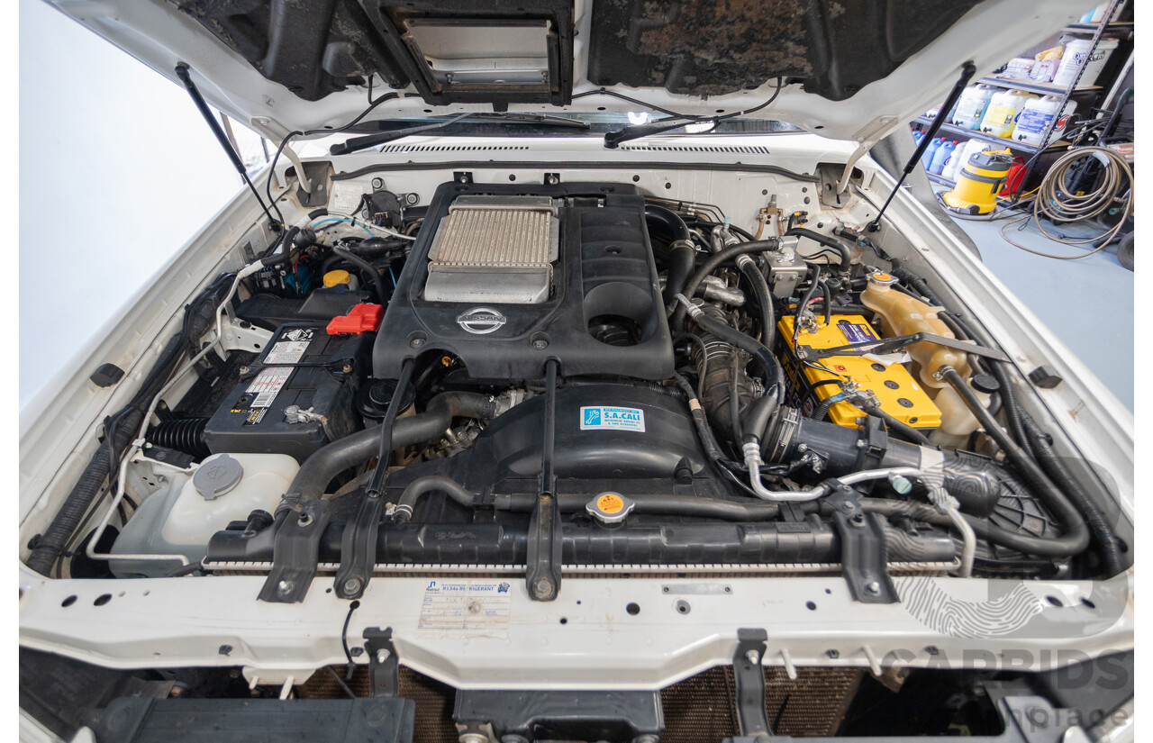 3/2010 Nissan Patrol ST (4x4) GU VI 4d Wagon Polar White Turbo Diesel 3.0L - 7 Seats