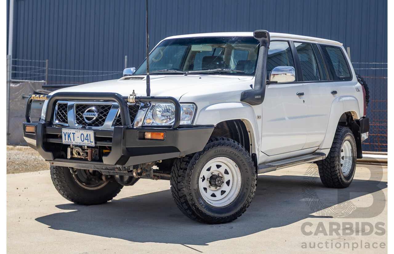 3/2010 Nissan Patrol ST (4x4) GU VI 4d Wagon Polar White Turbo Diesel 3.0L - 7 Seats