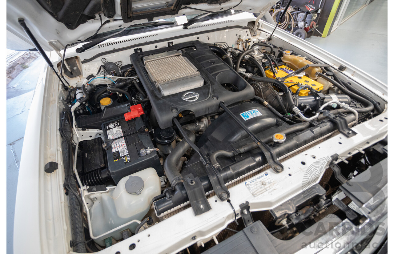 3/2010 Nissan Patrol ST (4x4) GU VI 4d Wagon Polar White Turbo Diesel 3.0L - 7 Seats