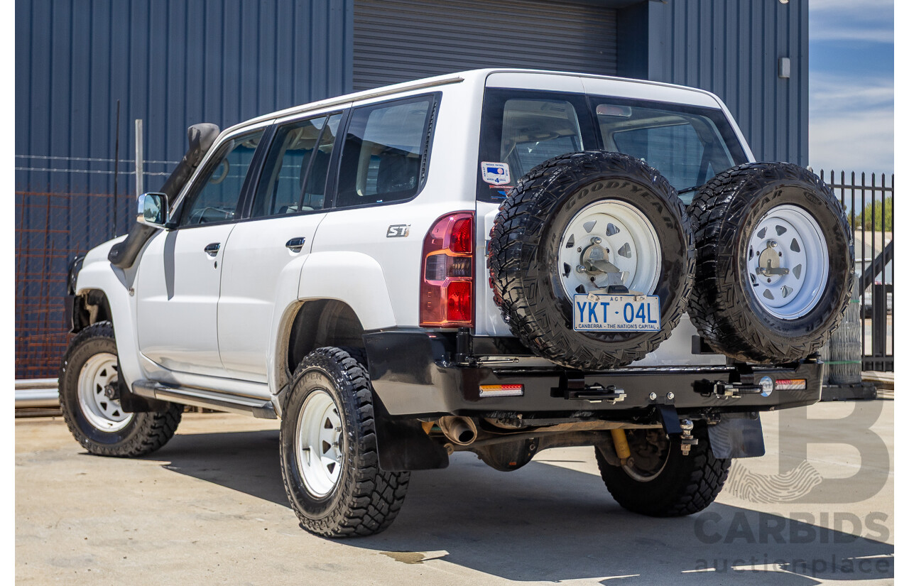 3/2010 Nissan Patrol ST (4x4) GU VI 4d Wagon Polar White Turbo Diesel 3.0L - 7 Seats