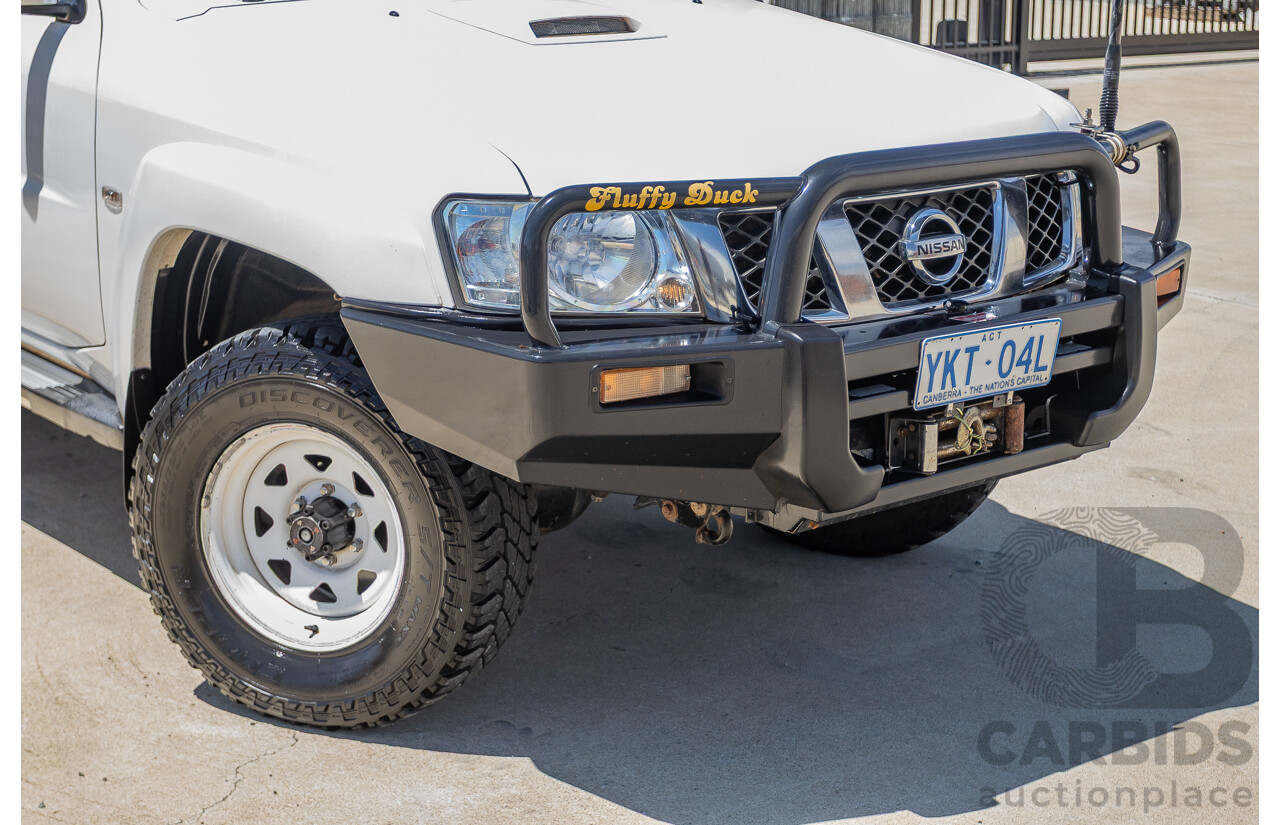 3/2010 Nissan Patrol ST (4x4) GU VI 4d Wagon Polar White Turbo Diesel 3.0L - 7 Seats