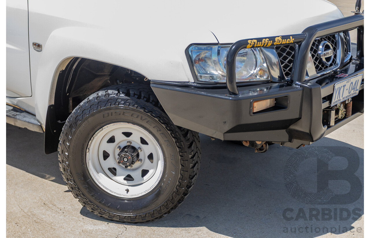 3/2010 Nissan Patrol ST (4x4) GU VI 4d Wagon Polar White Turbo Diesel 3.0L - 7 Seats