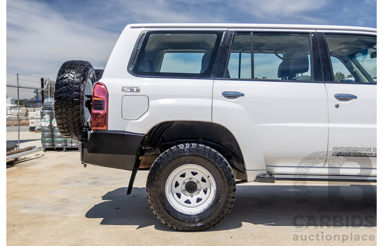 3/2010 Nissan Patrol ST (4x4) GU VI 4d Wagon Polar White Turbo Diesel 3.0L - 7 Seats