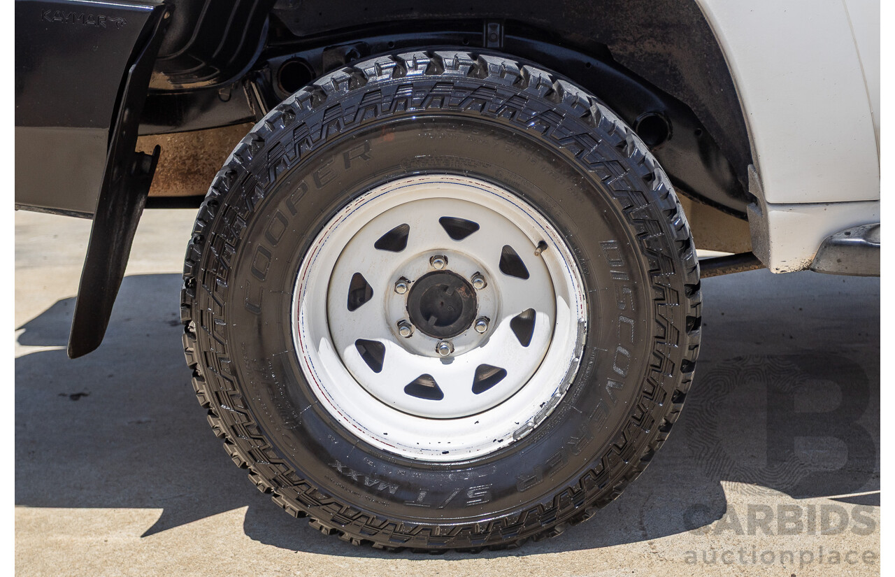 3/2010 Nissan Patrol ST (4x4) GU VI 4d Wagon Polar White Turbo Diesel 3.0L - 7 Seats