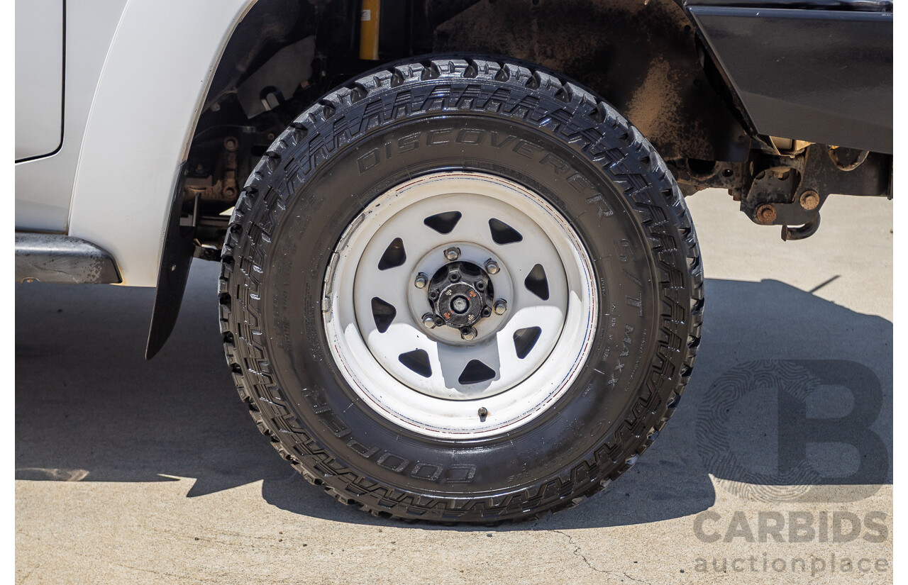 3/2010 Nissan Patrol ST (4x4) GU VI 4d Wagon Polar White Turbo Diesel 3.0L - 7 Seats