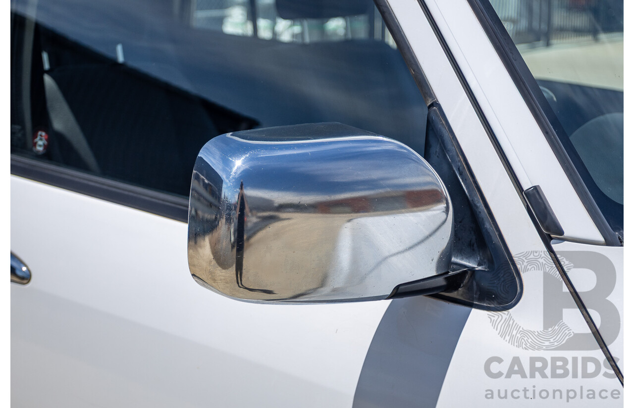 3/2010 Nissan Patrol ST (4x4) GU VI 4d Wagon Polar White Turbo Diesel 3.0L - 7 Seats