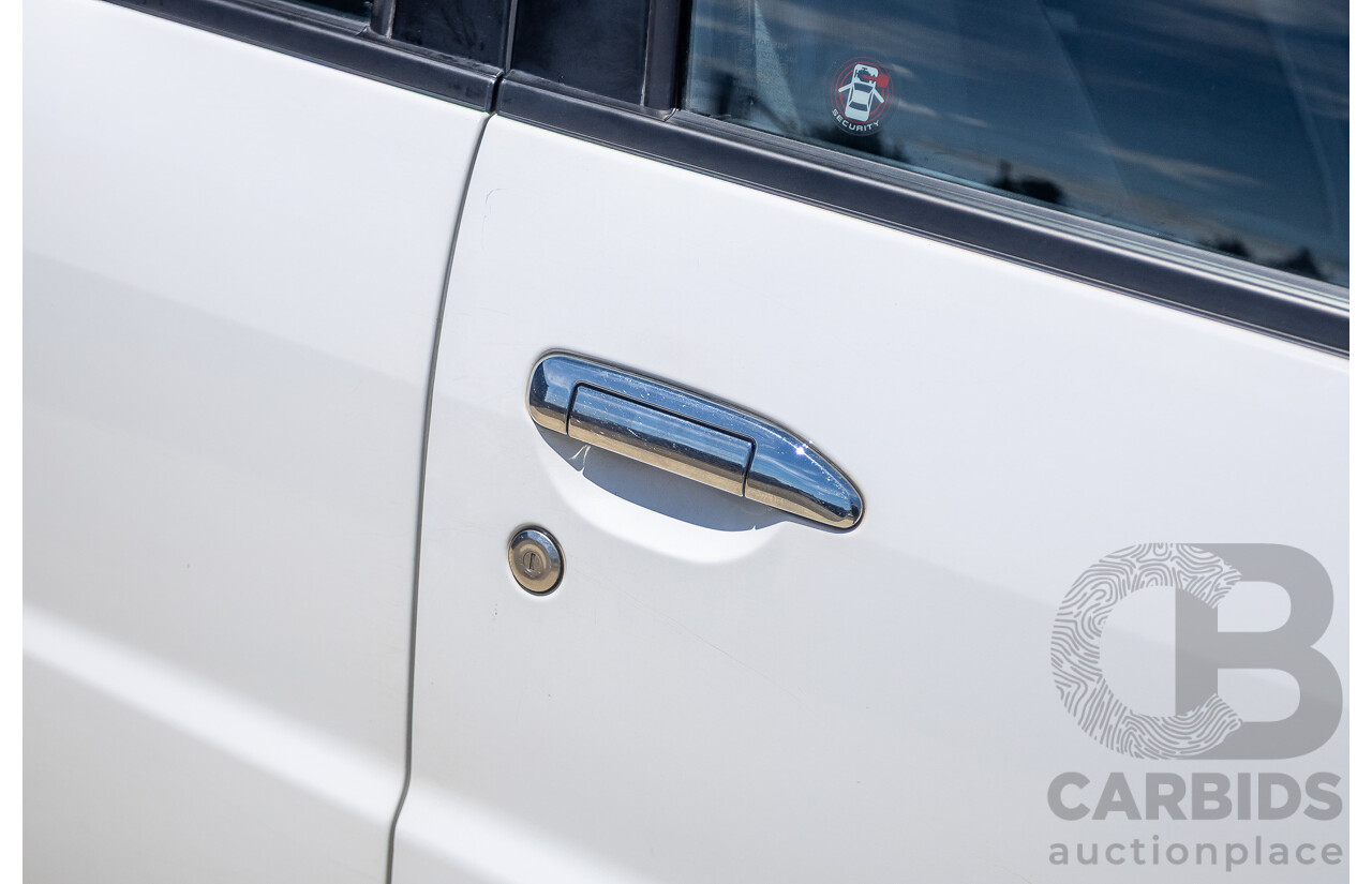 3/2010 Nissan Patrol ST (4x4) GU VI 4d Wagon Polar White Turbo Diesel 3.0L - 7 Seats