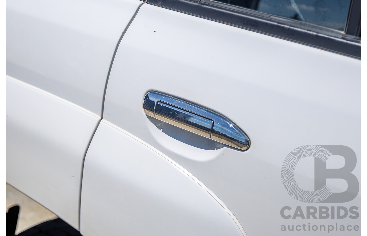 3/2010 Nissan Patrol ST (4x4) GU VI 4d Wagon Polar White Turbo Diesel 3.0L - 7 Seats