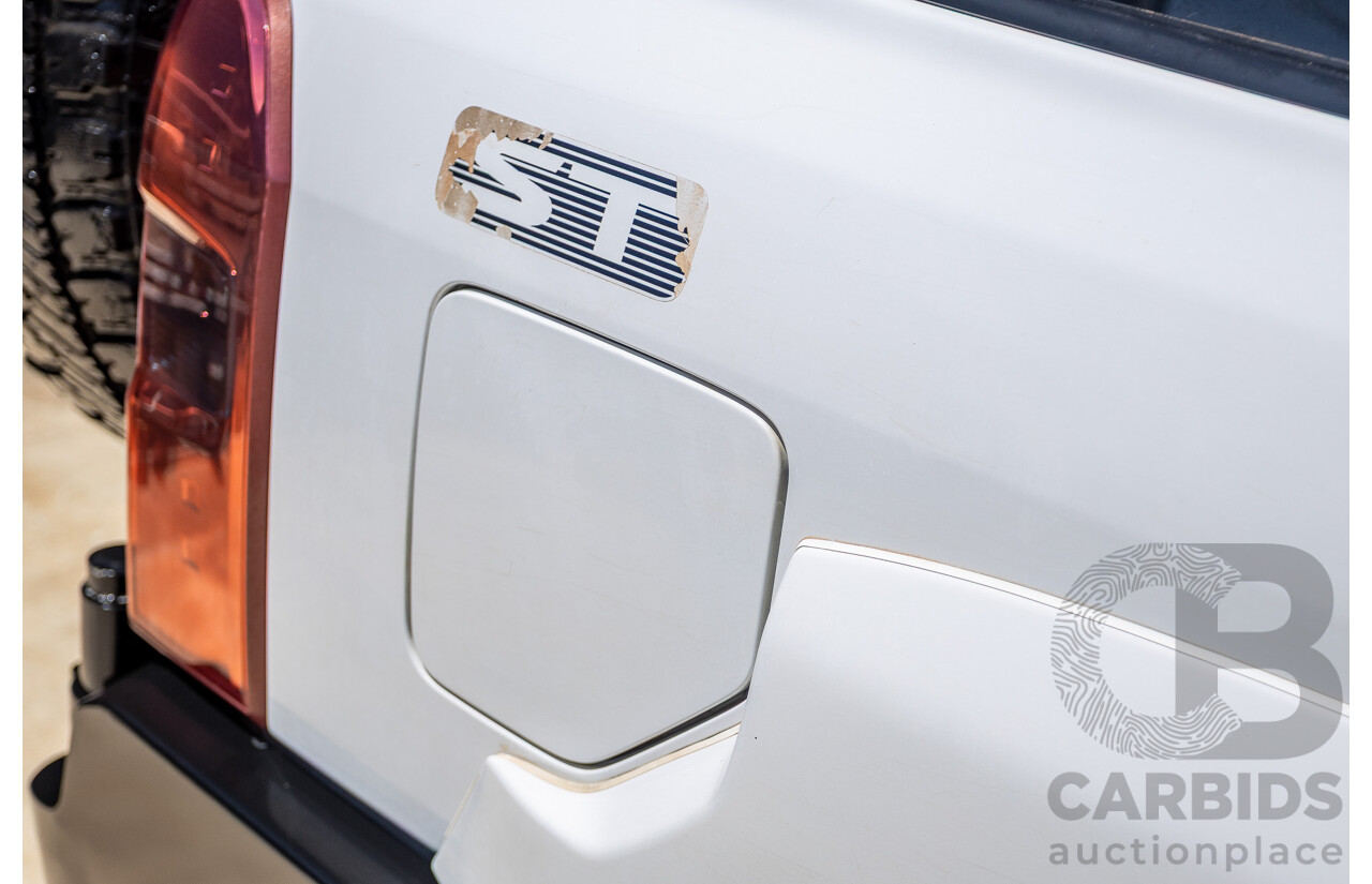 3/2010 Nissan Patrol ST (4x4) GU VI 4d Wagon Polar White Turbo Diesel 3.0L - 7 Seats