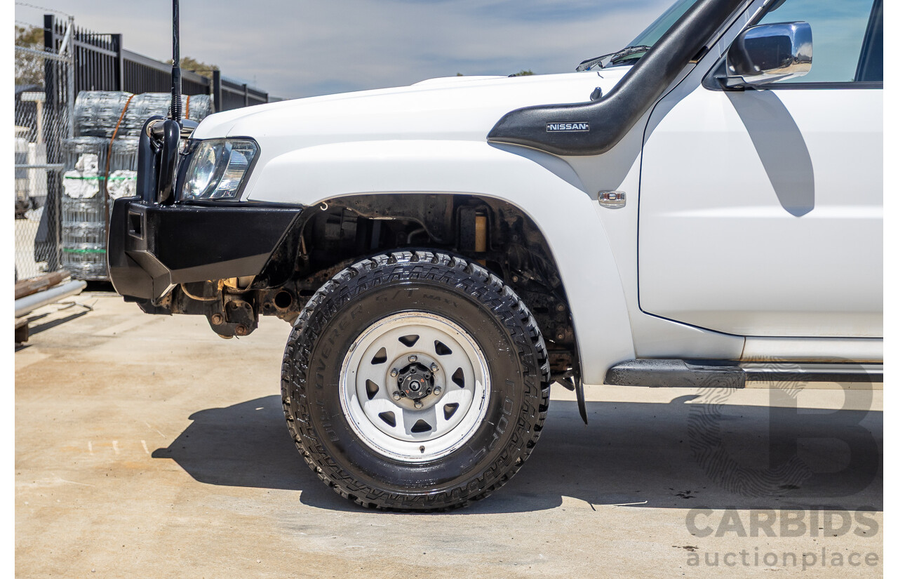 3/2010 Nissan Patrol ST (4x4) GU VI 4d Wagon Polar White Turbo Diesel 3.0L - 7 Seats