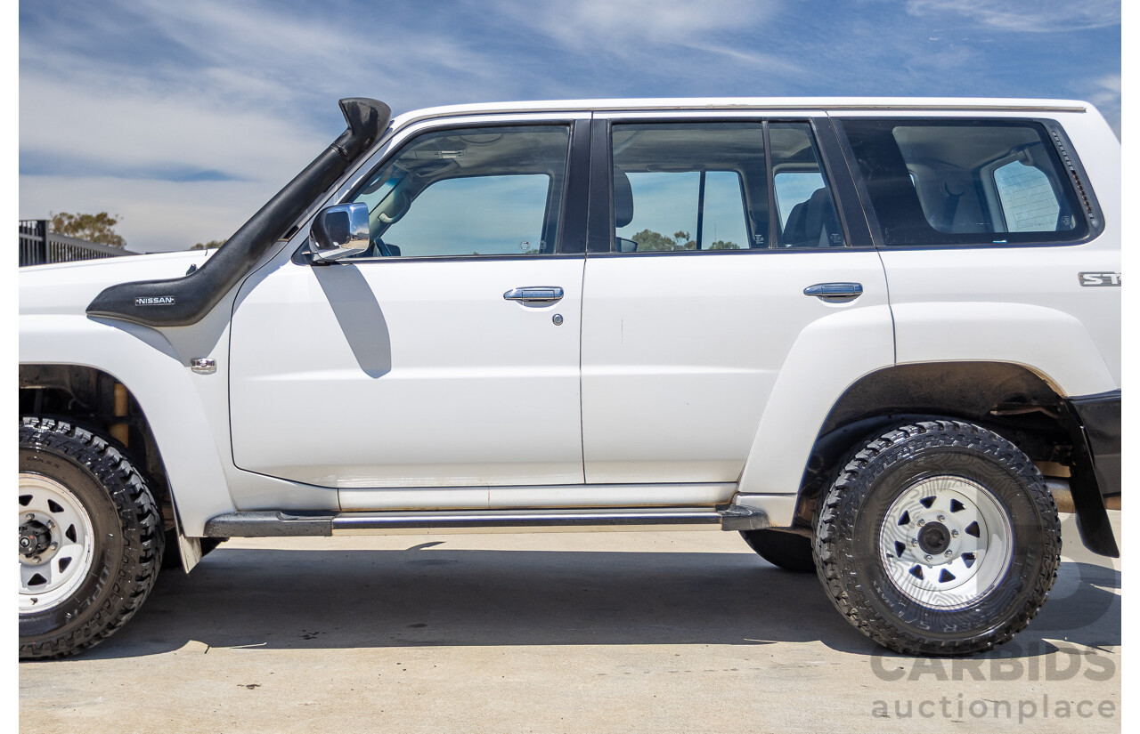3/2010 Nissan Patrol ST (4x4) GU VI 4d Wagon Polar White Turbo Diesel 3.0L - 7 Seats