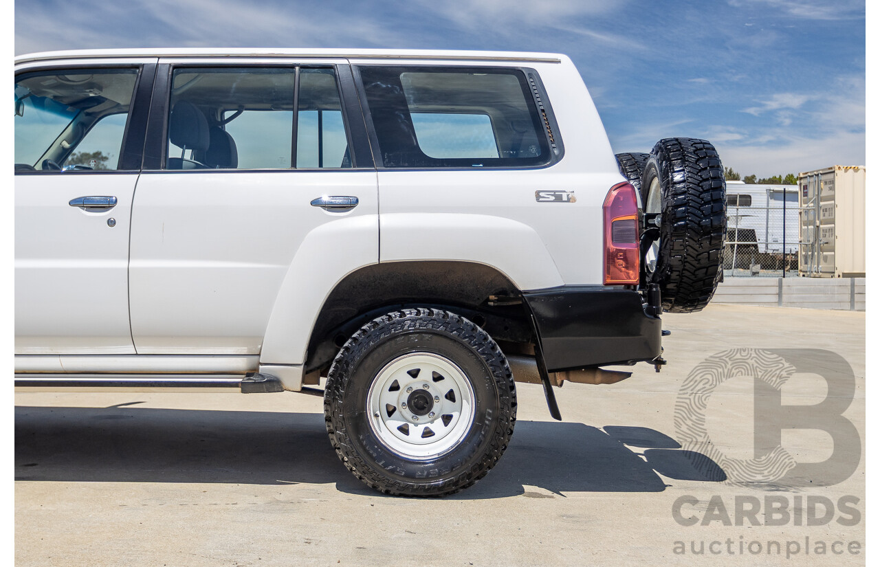 3/2010 Nissan Patrol ST (4x4) GU VI 4d Wagon Polar White Turbo Diesel 3.0L - 7 Seats